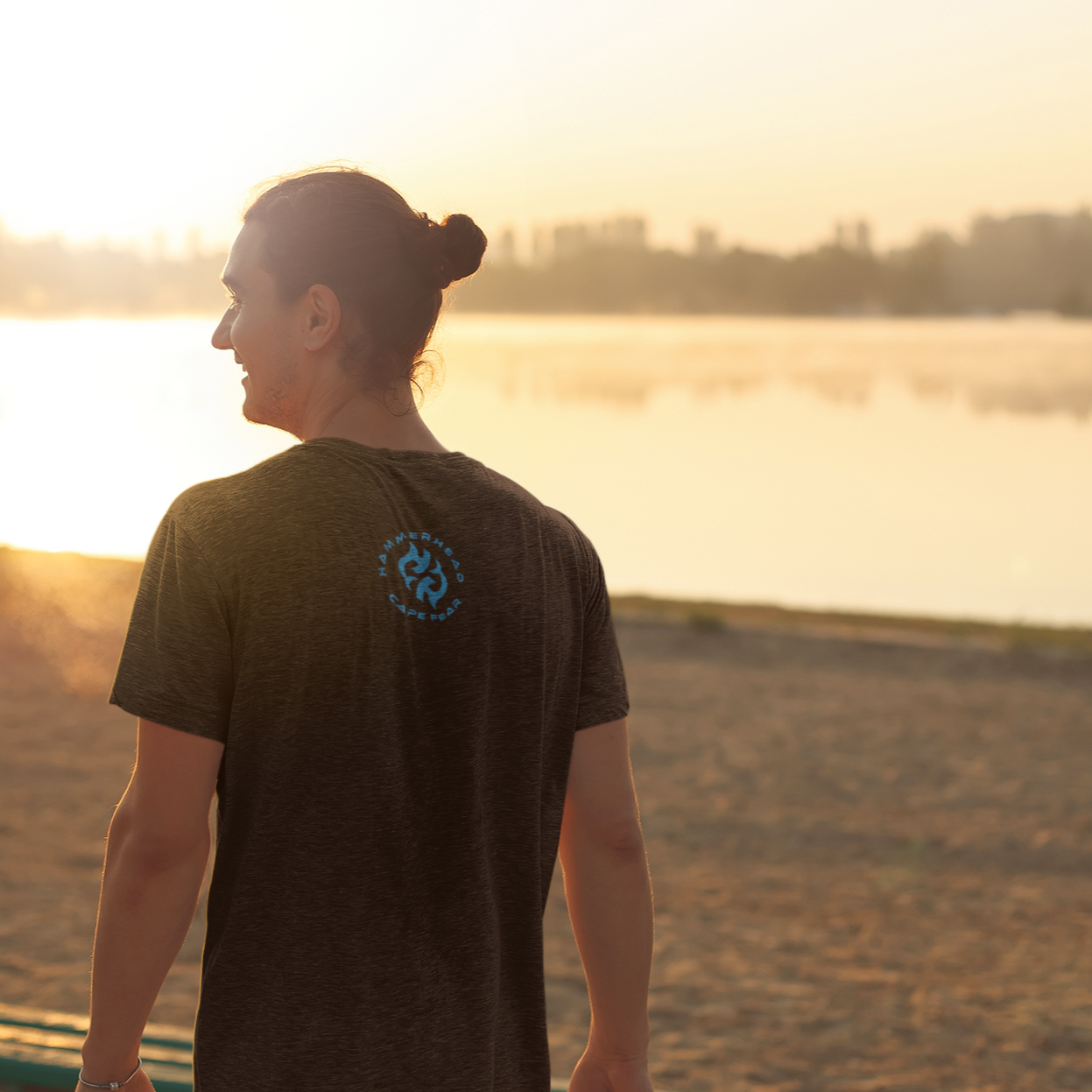 image of a man wearing a black shirt with his back facing